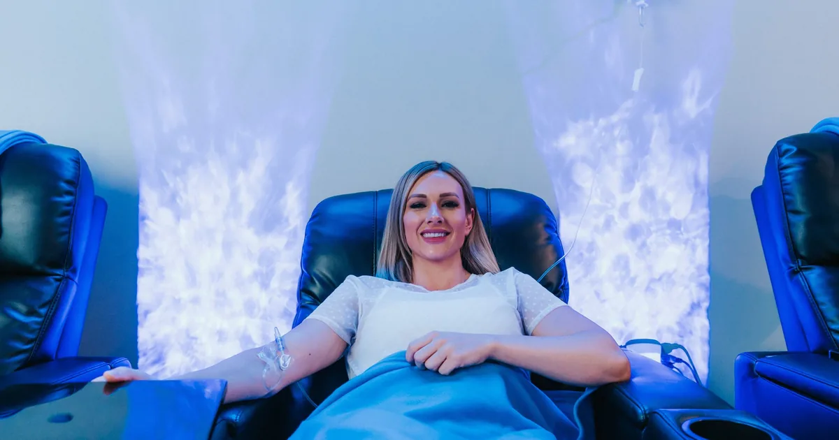 Client receiving IV hydration therapy for energy at iCRYO Grosse Pointe
